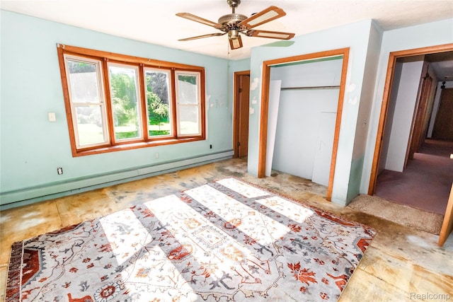 2380 Wilder Rd, Metamora, MI 48455 - unfurnished bedroom featuring a baseboard radiator and ceiling fan