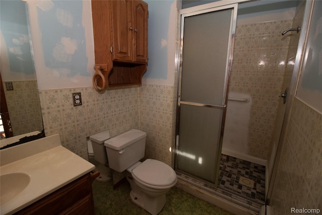 2380 Wilder Rd, Metamora, MI 48455 - full bathroom featuring a shower stall, vanity, wainscoting, and tile walls