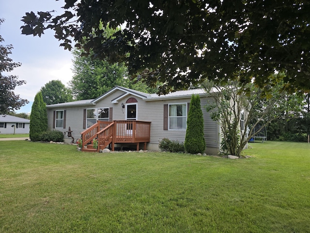 274 Pioneer St, Mendon, MI 49072 - manufactured / mobile home featuring a front lawn