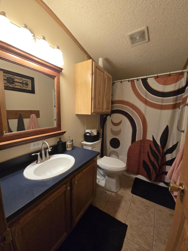 274 Pioneer St, Mendon, MI 49072 - bathroom featuring a textured ceiling, vanity, tile patterned flooring, and a shower with curtain