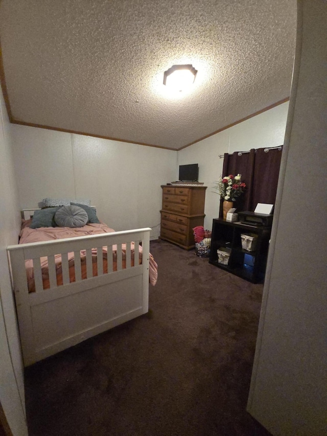 274 Pioneer St, Mendon, MI 49072 - bedroom with a textured ceiling, lofted ceiling, and dark carpet