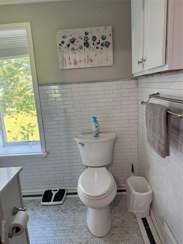 3981 Orchard Rd, Peck, MI 48466 - bathroom with tile walls, tile patterned flooring, a wainscoted wall, and vanity