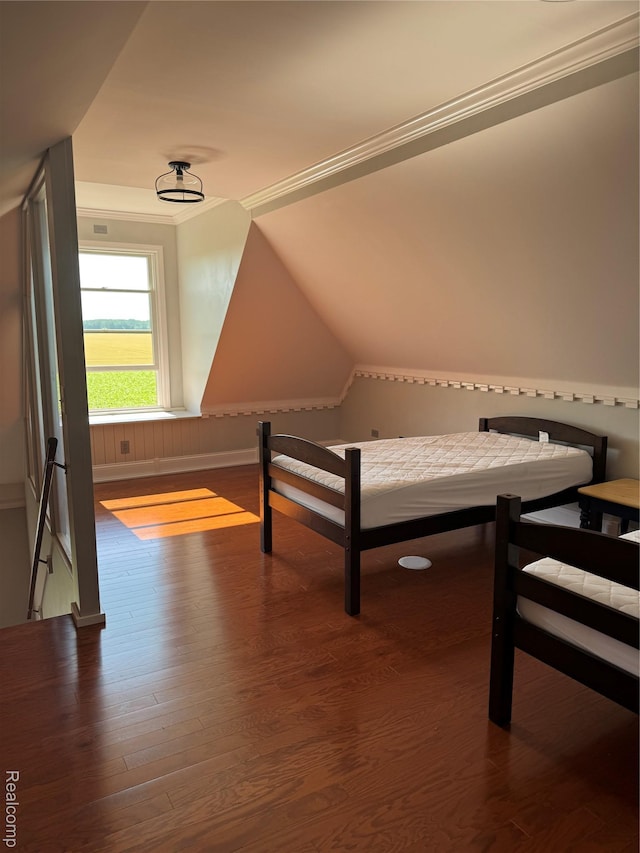 3981 Orchard Rd, Peck, MI 48466 - unfurnished bedroom with wood finished floors, crown molding, and lofted ceiling