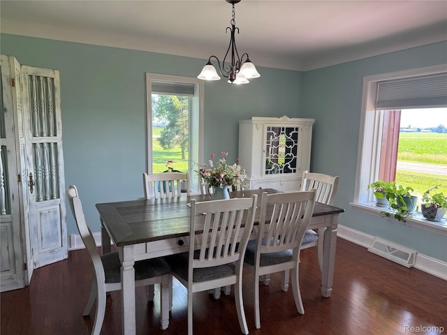 3981 Orchard Rd, Peck, MI 48466 - dining space featuring a chandelier and dark wood-type flooring