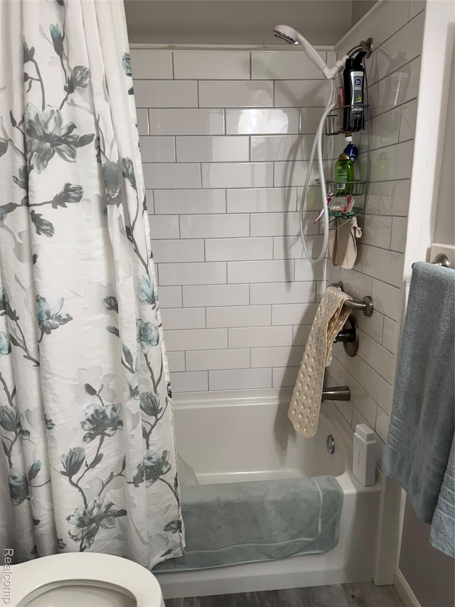 3981 Orchard Rd, Peck, MI 48466 - bathroom featuring shower / bath combo with shower curtain and toilet