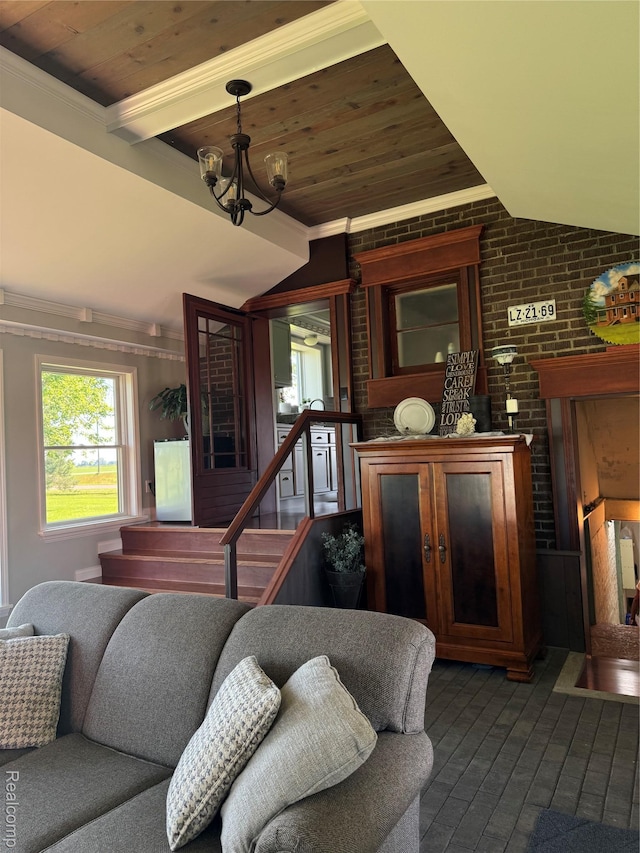 3981 Orchard Rd, Peck, MI 48466 - living room with wood ceiling, brick wall, vaulted ceiling, crown molding, and a chandelier
