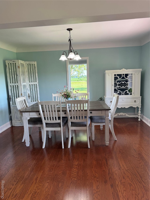 3981 Orchard Rd, Peck, MI 48466 - dining room featuring dark wood-style floors and baseboards