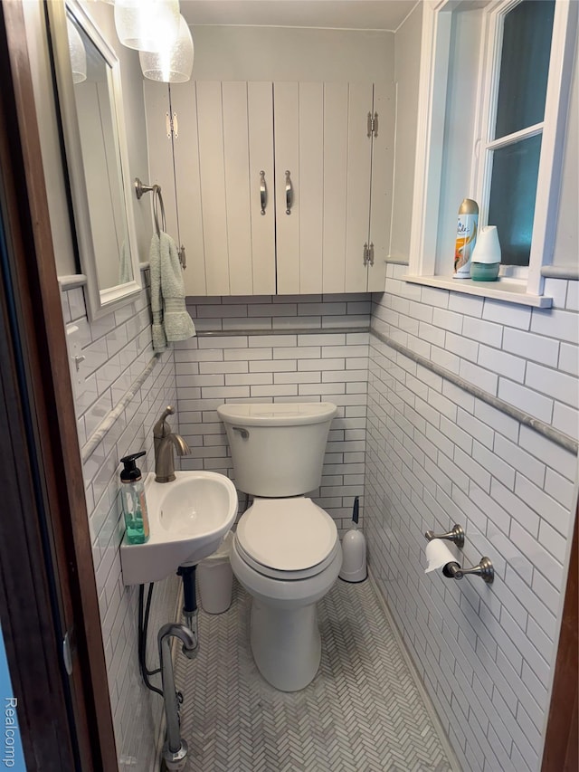 3981 Orchard Rd, Peck, MI 48466 - half bath with tile walls and a wainscoted wall