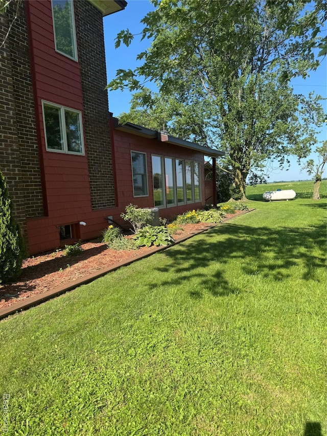 3981 Orchard Rd, Peck, MI 48466 - view of side of home with a yard