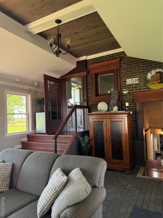 3981 Orchard Rd, Peck, MI 48466 - living room with vaulted ceiling, brick wall, wood ceiling, plenty of natural light, and a chandelier