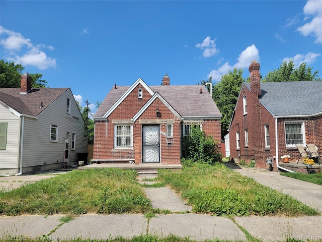 8850 Farmbrook St, Detroit, MI 48236 - bungalow-style home featuring brick siding