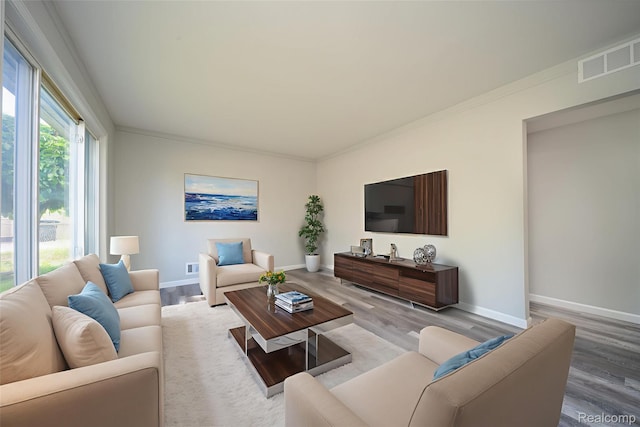 6448 Hunter Ct, Westland, MI 48185 - living area featuring wood finished floors and crown molding