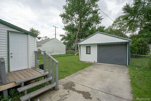 23199 Stewart Ave, Warren, MI 48089 - detached garage featuring driveway