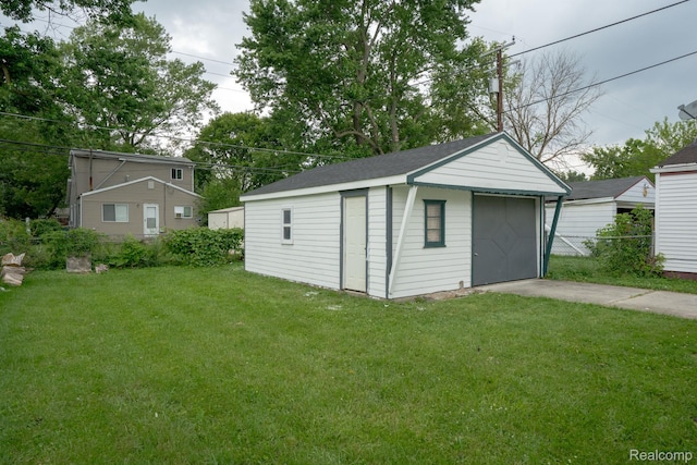 23199 Stewart Ave, Warren, MI 48089 - view of outdoor structure with concrete driveway