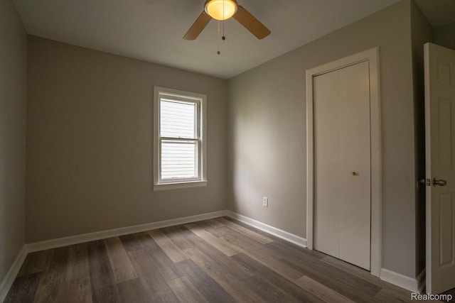 23199 Stewart Ave, Warren, MI 48089 - unfurnished bedroom featuring wood finished floors, ceiling fan, and a closet