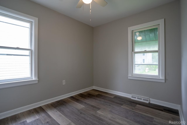 23199 Stewart Ave, Warren, MI 48089 - spare room featuring plenty of natural light, wood finished floors, and a ceiling fan