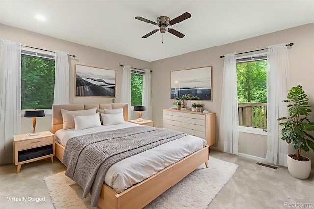 21433 Archwood Cir, Farmington Hills, MI 48336 - bedroom with light colored carpet and ceiling fan