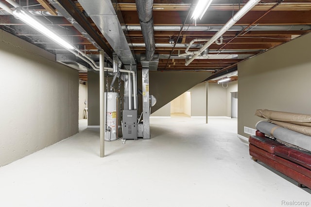 21433 Archwood Cir, Farmington Hills, MI 48336 - unfinished basement featuring gas water heater and heating unit