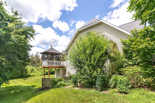 8150 Mester Rd, Chelsea, MI 48118 - view of grassy yard featuring a sunroom