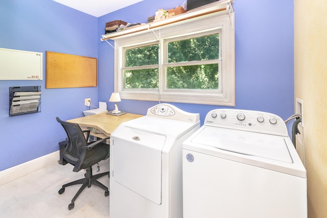 8150 Mester Rd, Chelsea, MI 48118 - laundry room with separate washer and dryer and an office area