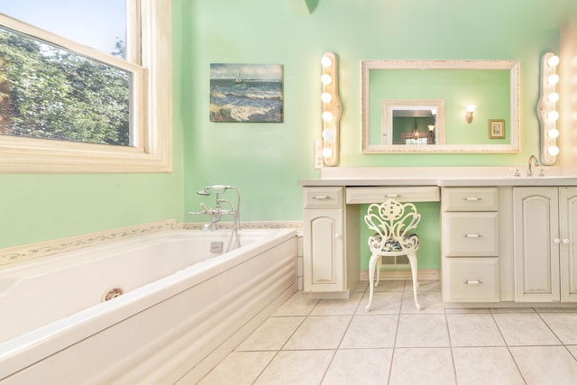 8150 Mester Rd, Chelsea, MI 48118 - full bath featuring a tub with jets, vanity, and tile patterned floors