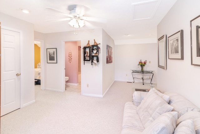 8150 Mester Rd, Chelsea, MI 48118 - living area with light colored carpet, a ceiling fan, and attic access