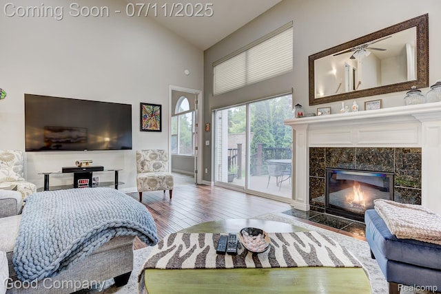 4361 Bennett Park Cir, Troy, MI 48085 - living area with hardwood / wood-style flooring, a fireplace, high vaulted ceiling, and a ceiling fan
