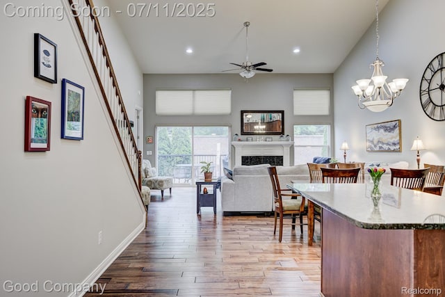 4361 Bennett Park Cir, Troy, MI 48085 - kitchen with plenty of natural light, ceiling fan, hardwood / wood-style flooring, recessed lighting, and a fireplace