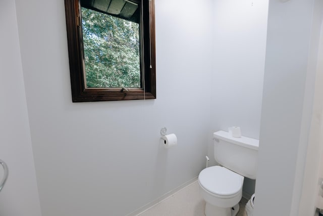 18400 N Fruitport Rd, Spring Lake, MI 49456 - bathroom featuring toilet and tile patterned floors