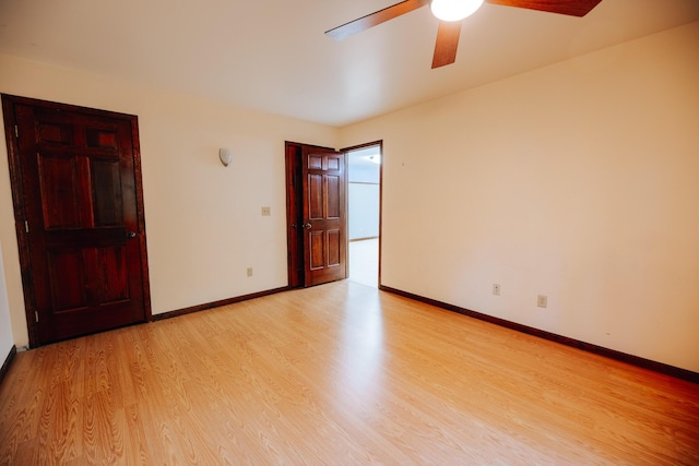 18400 N Fruitport Rd, Spring Lake, MI 49456 - spare room featuring ceiling fan and light wood-type flooring