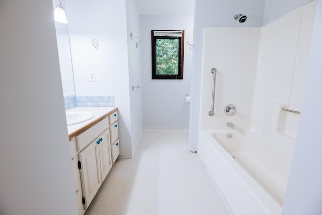 18400 N Fruitport Rd, Spring Lake, MI 49456 - bathroom with vanity and bathtub / shower combination