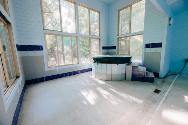 18400 N Fruitport Rd, Spring Lake, MI 49456 - sunroom / solarium with plenty of natural light and a hot tub