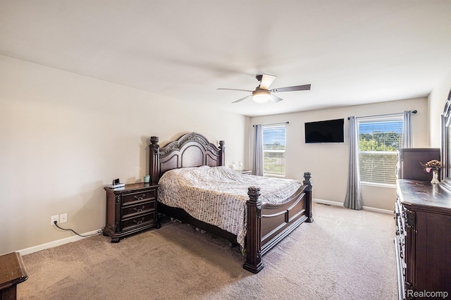 16621 Charles Town Ct, Linden, MI 48451 - bedroom with light colored carpet and ceiling fan