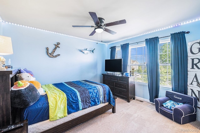 16621 Charles Town Ct, Linden, MI 48451 - bedroom featuring light carpet and ceiling fan