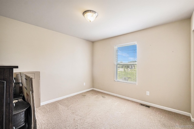 16621 Charles Town Ct, Linden, MI 48451 - unfurnished room featuring carpet floors and baseboards