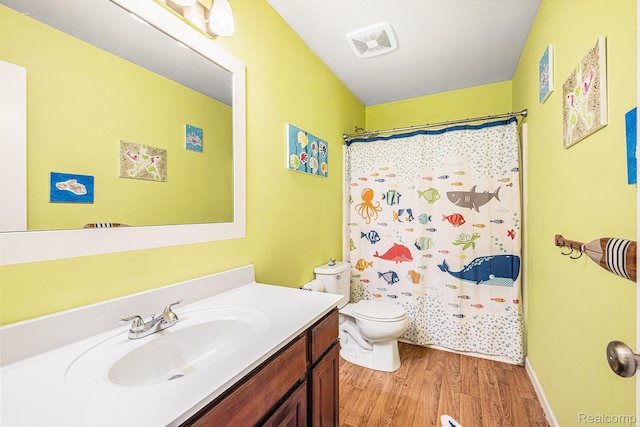 16621 Charles Town Ct, Linden, MI 48451 - bathroom featuring wood finished floors, vanity, and a shower with shower curtain