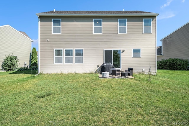 16621 Charles Town Ct, Linden, MI 48451 - rear view of property featuring a lawn, a patio, and outdoor lounge area