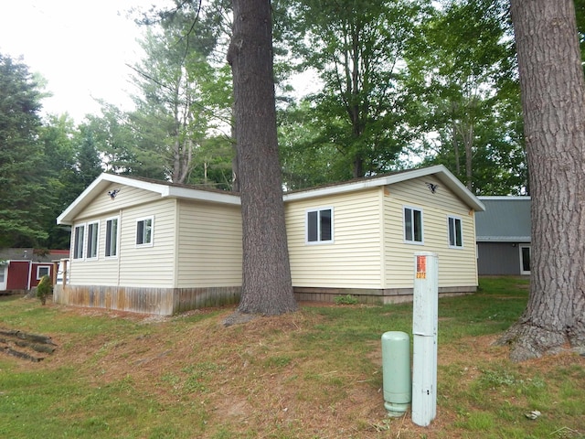 2322 Tittabawassee Ave, Alger, MI 48610 - view of side of property with a yard