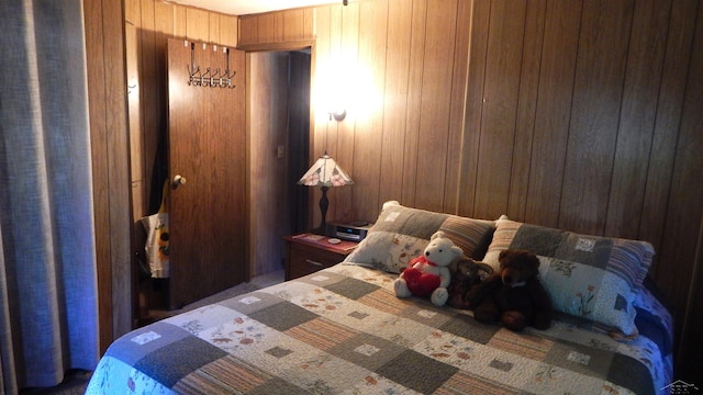 2319 Tittabawassee Ave, Alger, MI 48610 - carpeted bedroom with wooden walls