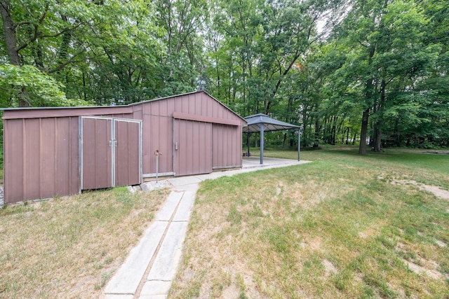 23974 Hooker Dr, Sand Lake, MI 49343 - view of green lawn with an outdoor structure