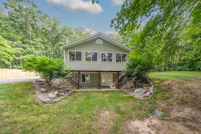 23974 Hooker Dr, Sand Lake, MI 49343 - view of front of house featuring a patio area