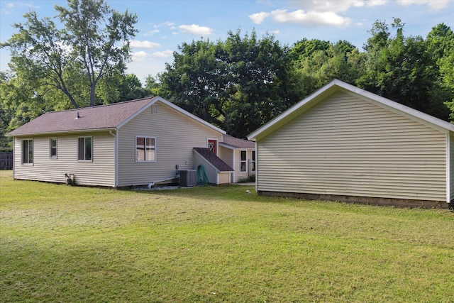 806 10th St, Plainwell, MI 49080 - view of home's exterior with a yard and view of scattered trees