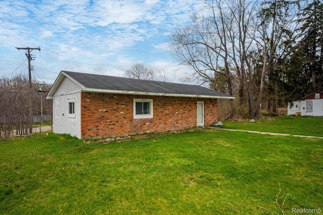 10685 Dixie Hwy, Davisburg, MI 48350 - view of side of property featuring a lawn and brick siding
