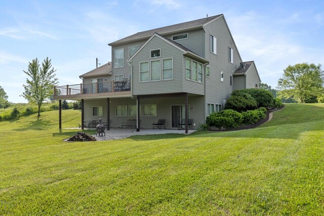 9752 Jackson Rd, Clarksville, MI 48815 - rear view of property with a patio area, a yard, and a balcony