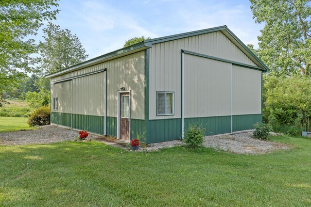 9752 Jackson Rd, Clarksville, MI 48815 - view of pole building featuring a lawn