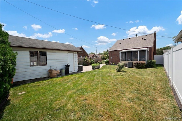 8220 Hartwell St, Detroit, MI 48228 - fenced backyard featuring a sunroom