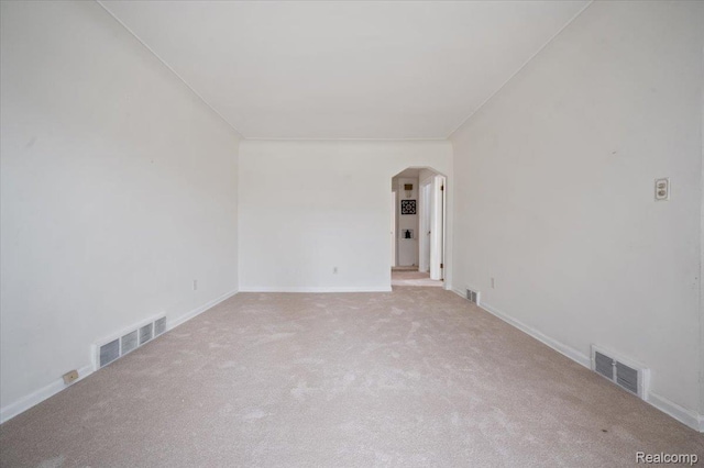 8220 Hartwell St, Detroit, MI 48228 - spare room featuring arched walkways and carpet floors