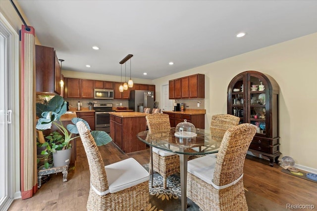 14236 Marshall Dr, Redford, MI 48239 - dining area with wood finished floors and recessed lighting