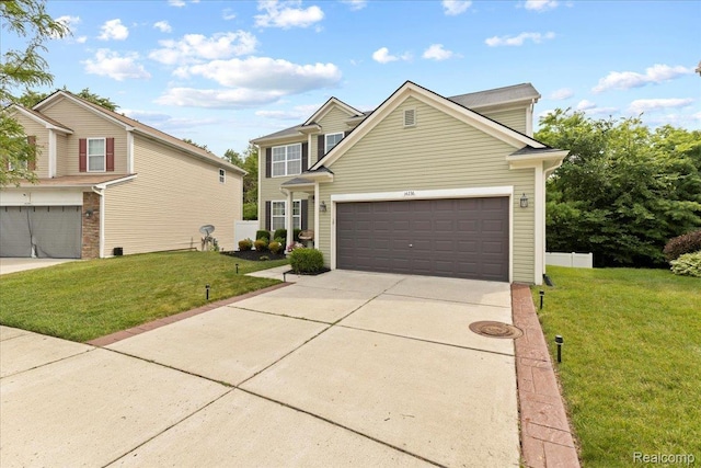 14236 Marshall Dr, Redford, MI 48239 - traditional home featuring a front lawn, concrete driveway, and an attached garage