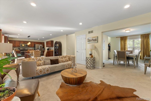 14236 Marshall Dr, Redford, MI 48239 - living room featuring recessed lighting, light colored carpet, and arched walkways